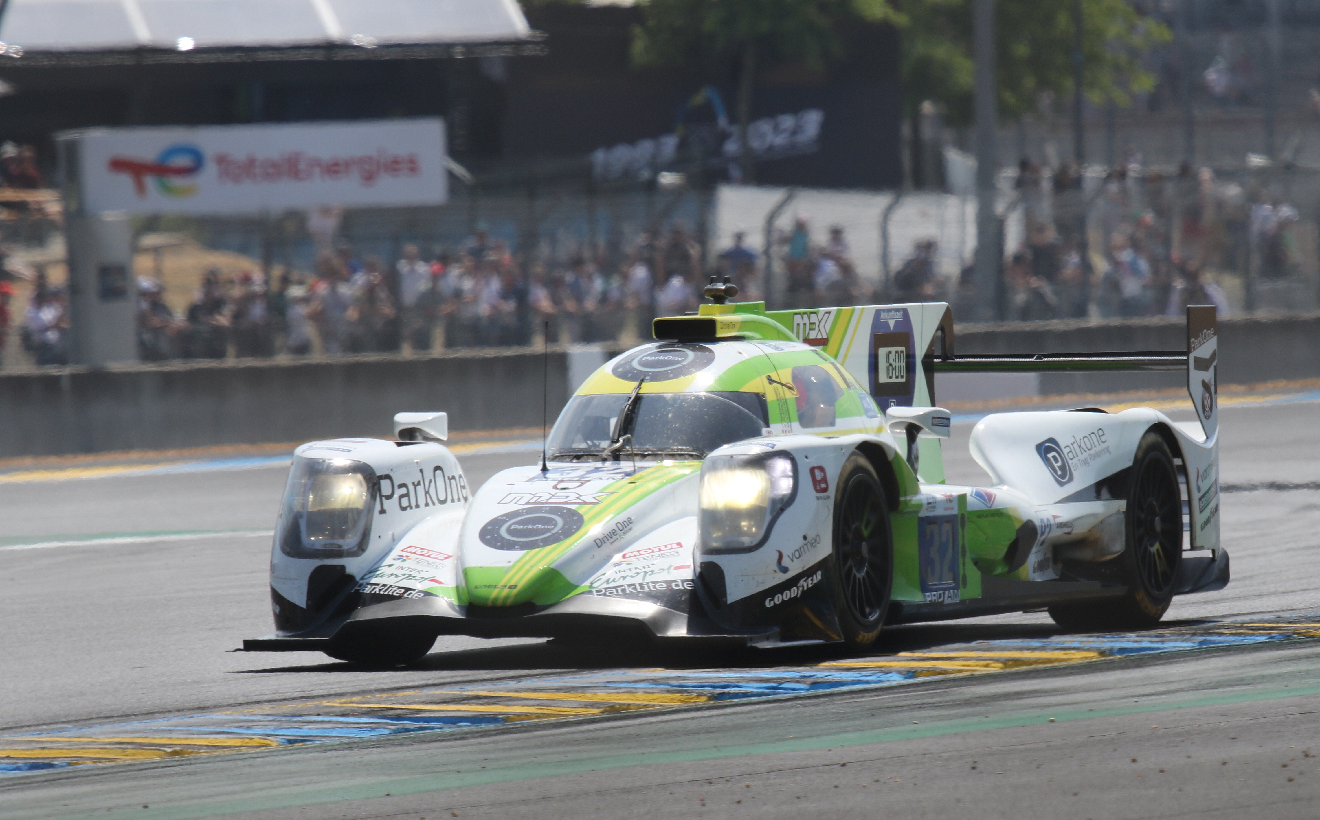 Oreca 07 - Mark Kwamme, Jan Magnussen & Anders Fjordbach exit Dunlop Chicane at the 2023 Le Mans (53365771647).jpg