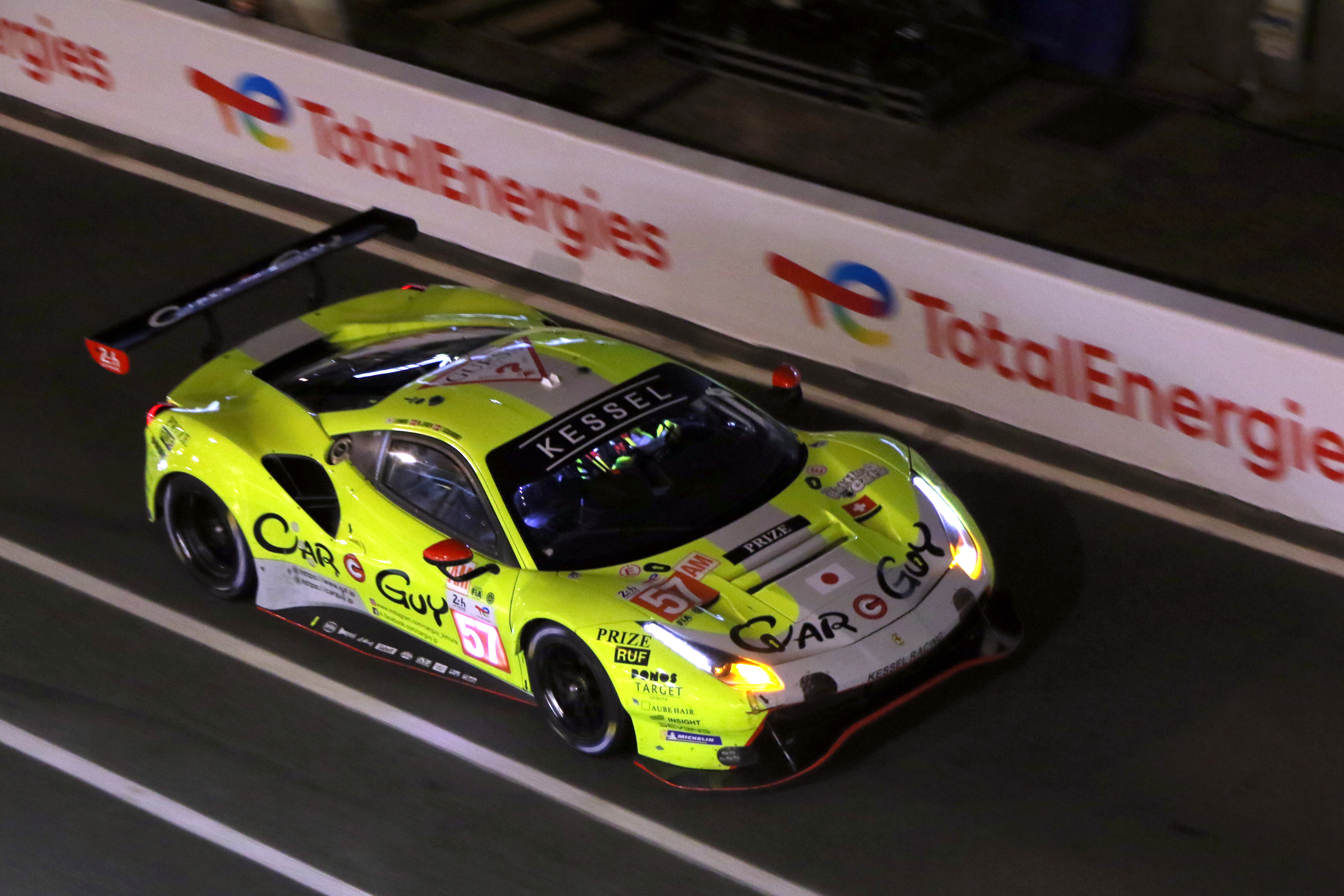 Ferrari 488 GTE EVO - Takeshi Kimura, Frederik Schandorff & Mikkel Jensen in the pit lane at the 2022 Le Mans (54281314246).jpg