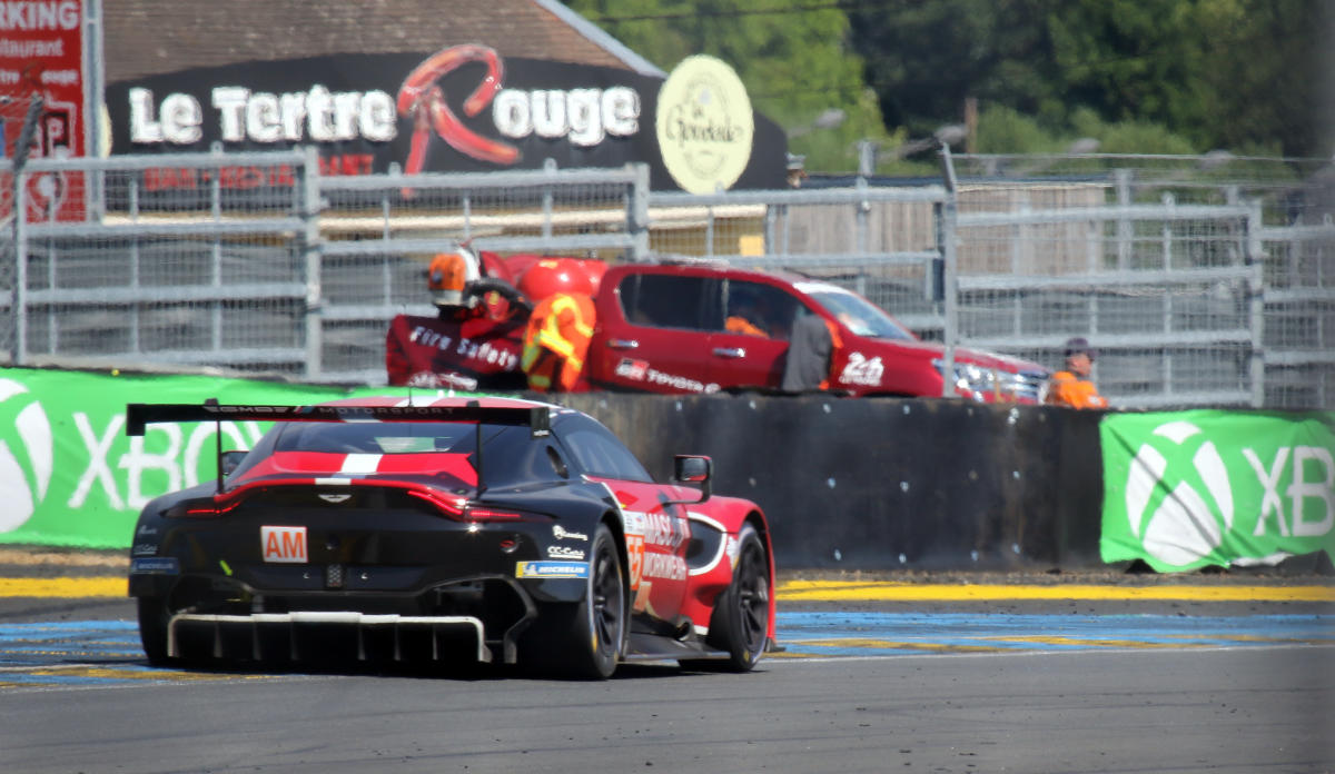Aston Martin Vantage AMR - Gustav Dahlmann Birch, Marco Sorensen & Jens Reno Moller passes Tertre Rouge Bar at the 2023 Le Mans (53470347770).jpg